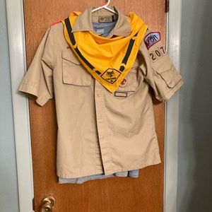 Boy Scouts uniform jacket, bandana, and T-shirt
